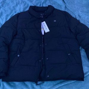 Medium Calvin Klein puffer coat,water resistant stretchy material